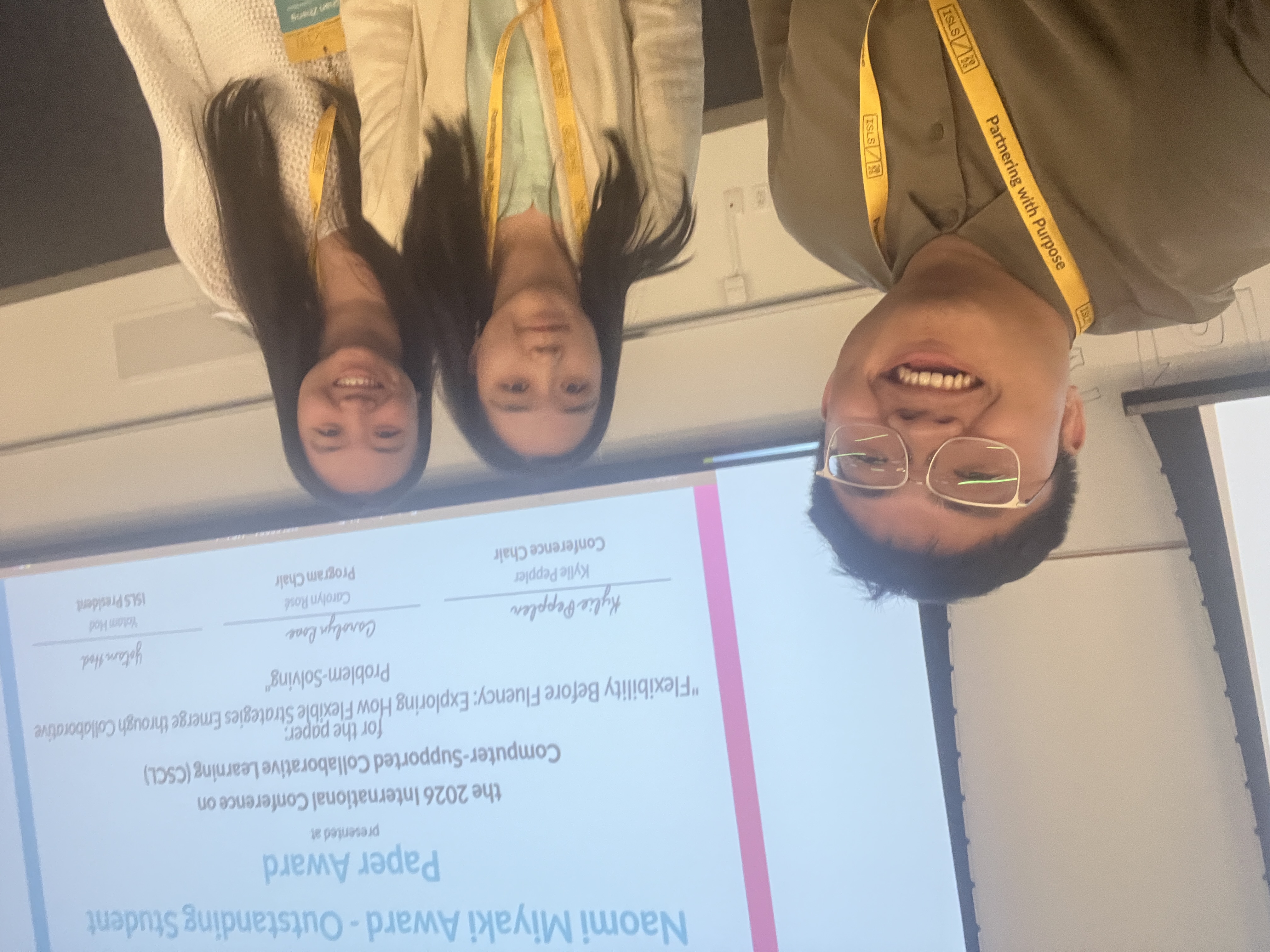 Chip Li, Seiyon Lee, and Shan Zhang after receiving the Outstanding Student Paper Award