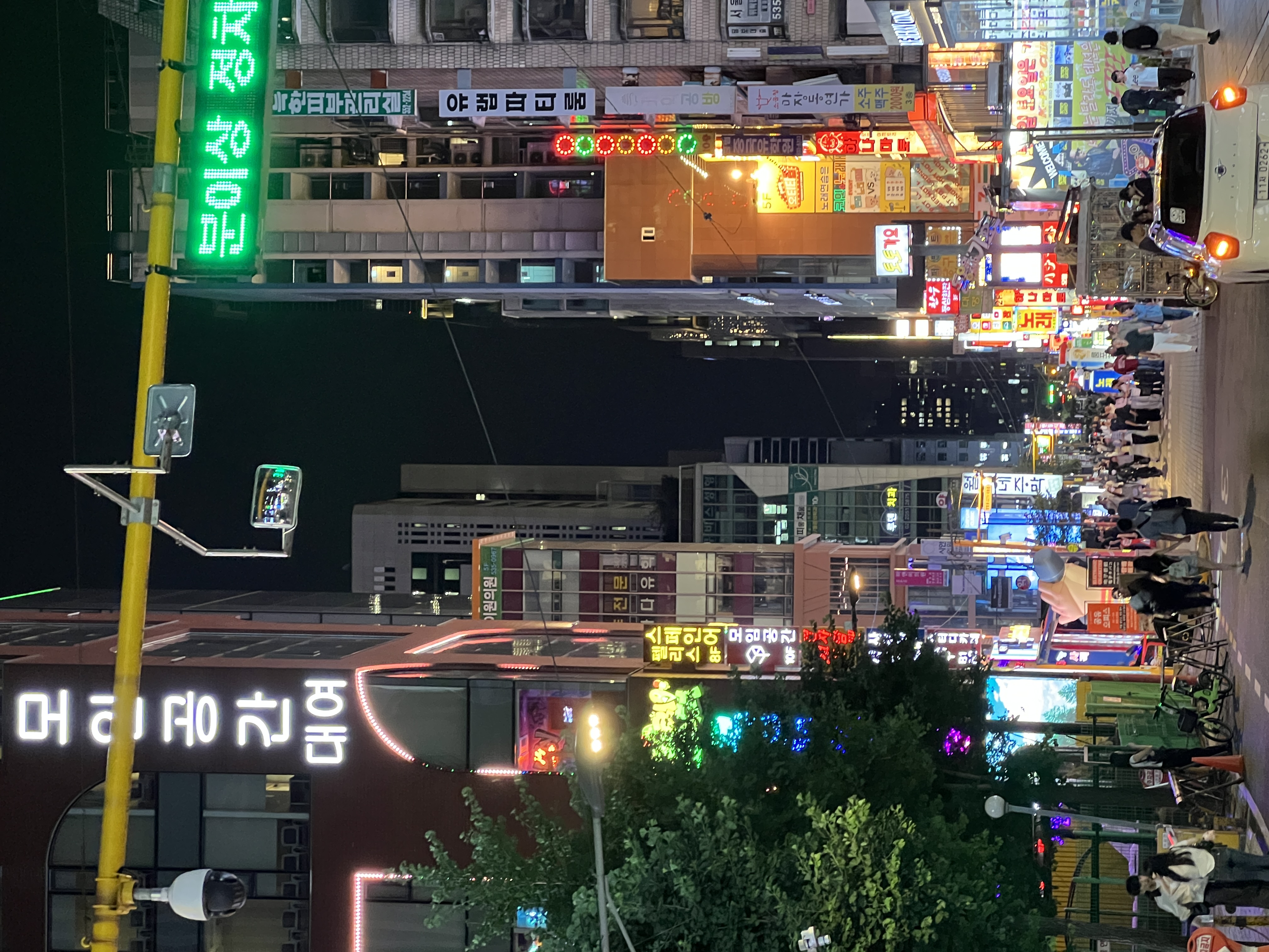 A lively street in Gangnam, Seoul, at night